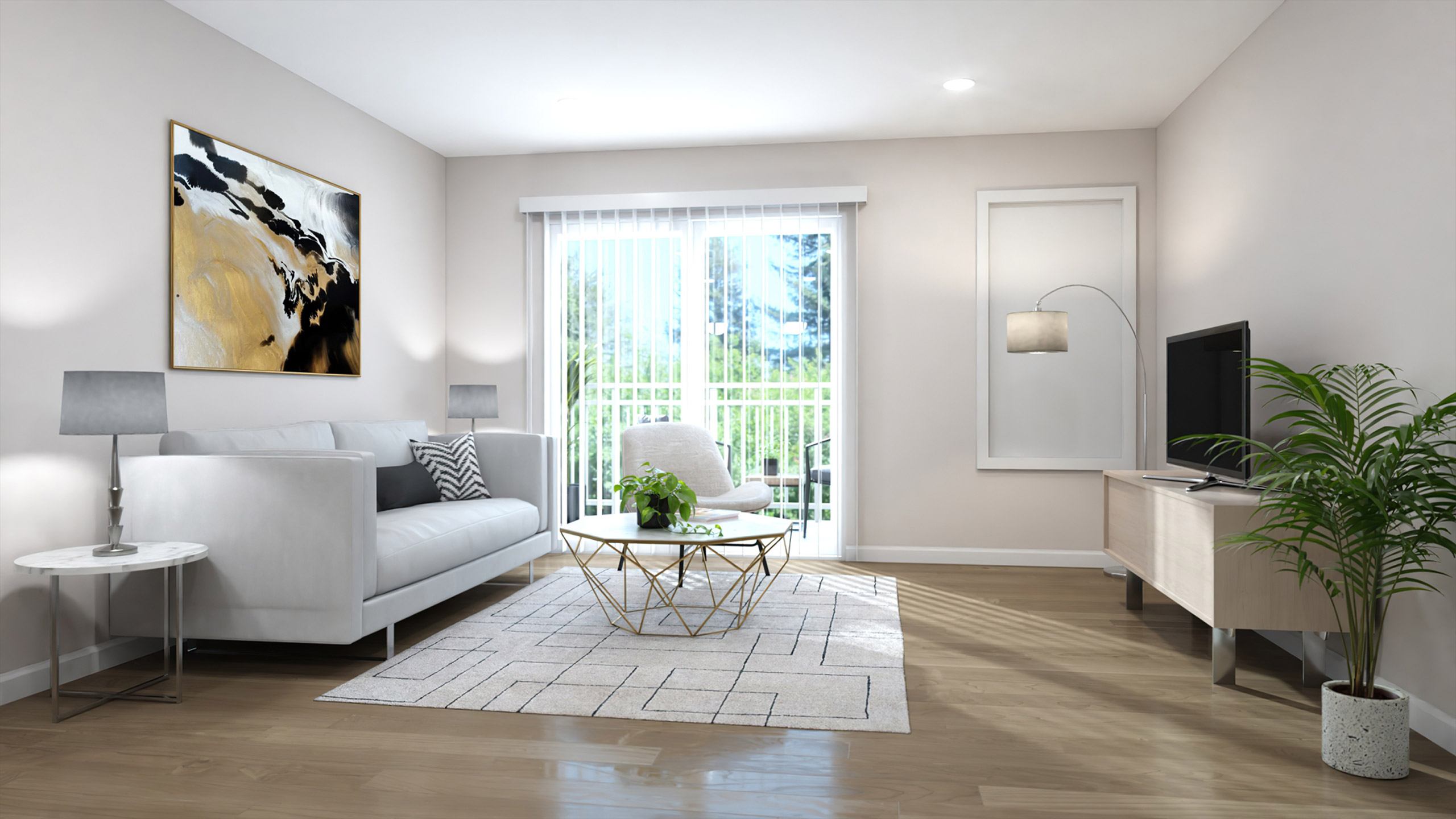 A living room with a white couch, a painting on the wall, and a potted plant.